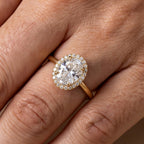 Close-up of 3CT oval diamond halo engagement ring