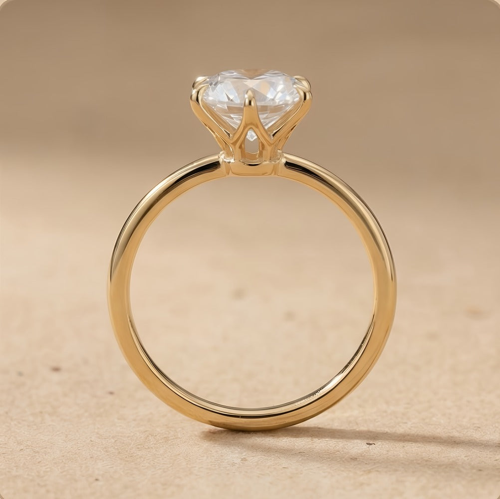 Round diamond promise ring close-up on prong detail