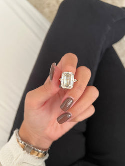 Shine bright with this 7.50 CT emerald-cut Art Deco ring