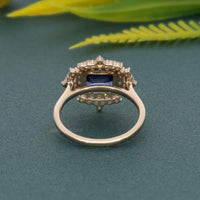 Bague de fiançailles antique en saphir bleu royal avec halo de diamants et saphir