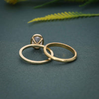 Bezel Set Oval Cut Lab Grown Diamond Wedding Ring With Matching Band