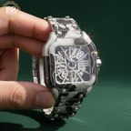 Bicolor zebra print black and white bust down watch fully iced with moissanite stones, featuring bold striped detailing across the dial and band for a striking, high-shine statement look.