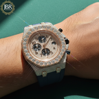Luxury diamond-encrusted watch on a wrist with JBR Jewellers