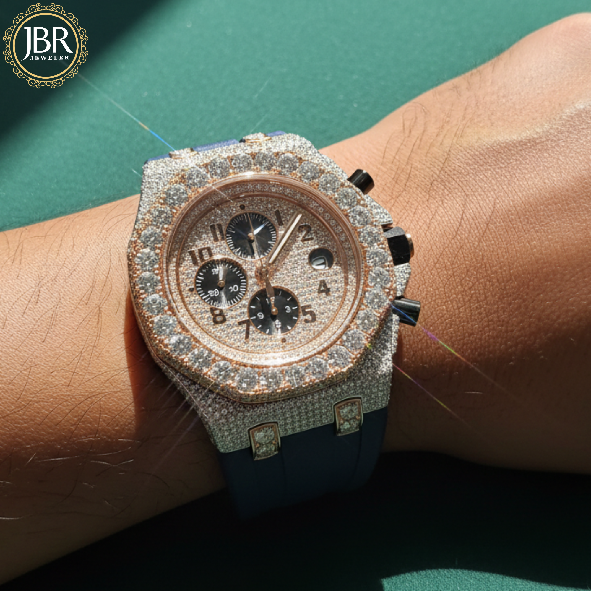 Luxury diamond-encrusted watch on a wrist with JBR Jewellers
