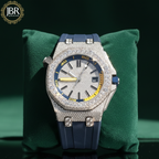 Blue silicone strap automatic moissanite iced bling diamond watch with sparkling stones, bold dial, and luxury hip hop design.