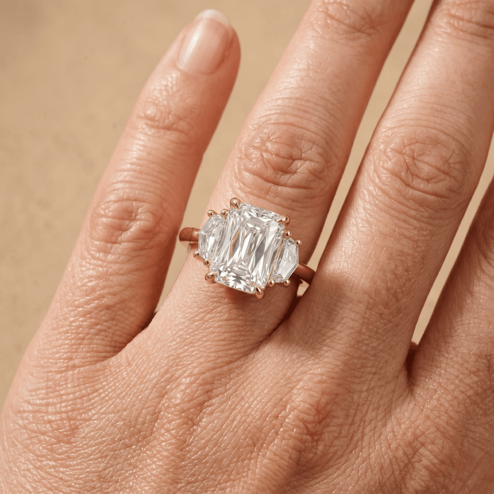 Modern three stone diamond ring