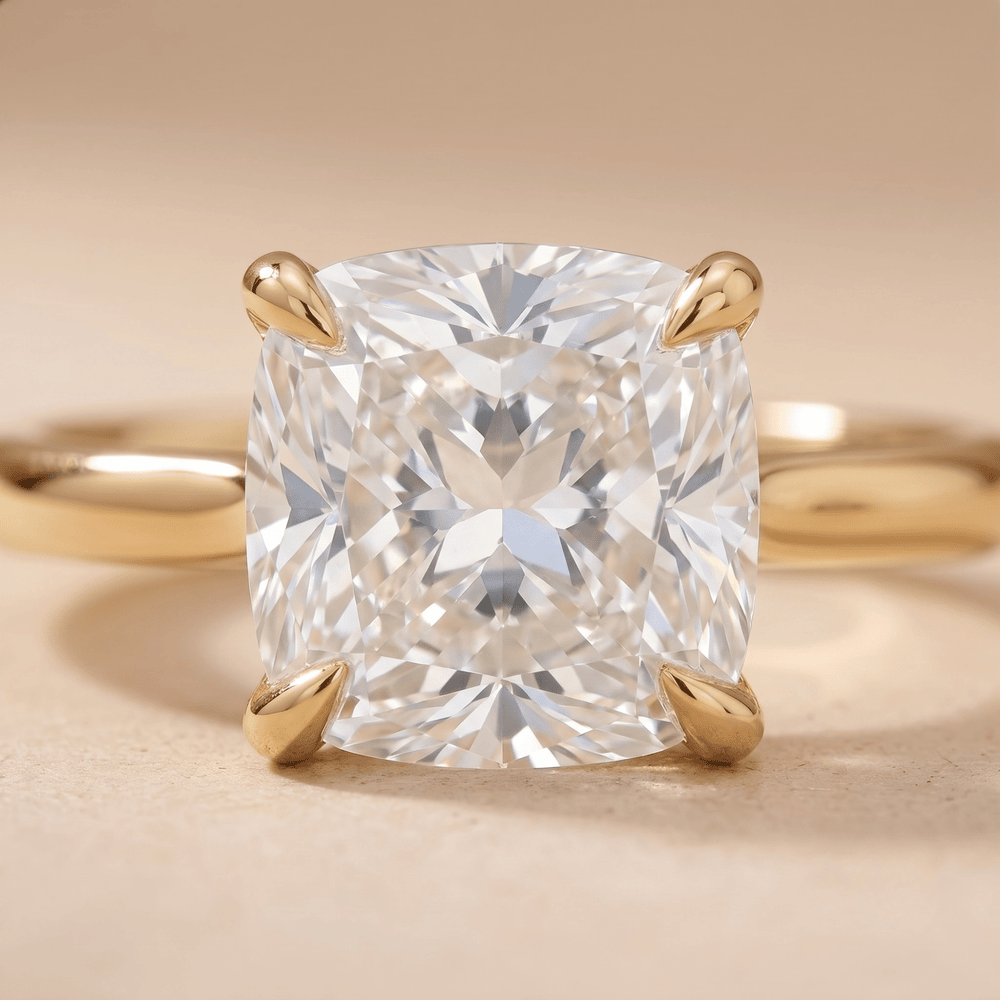 Cathedral setting cushion engagement ring close-up