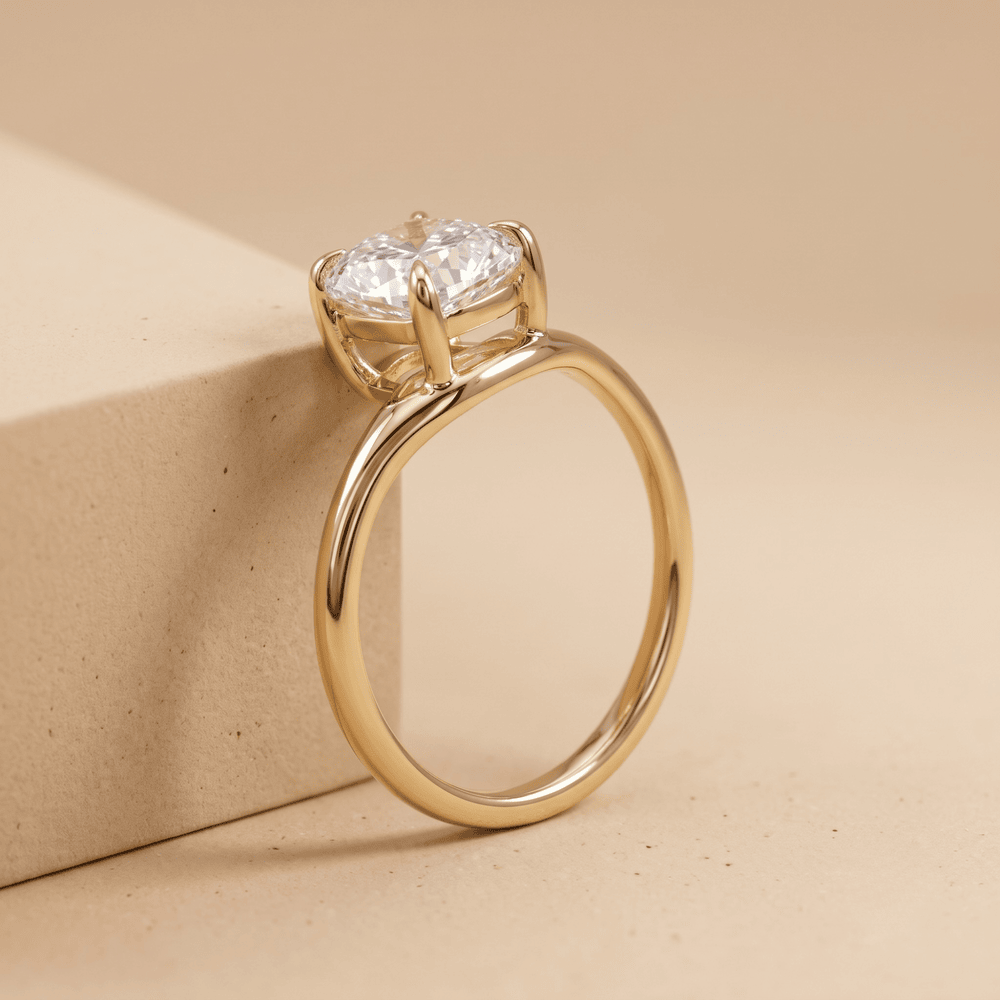 Simple 14K gold cushion cut curved wedding band