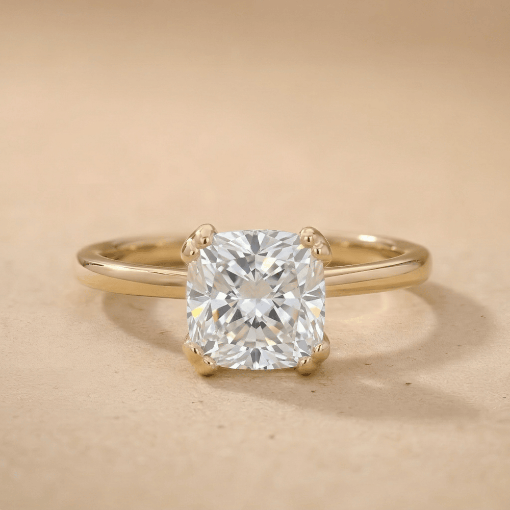 Cushion moissanite dual prong solitaire ring front view