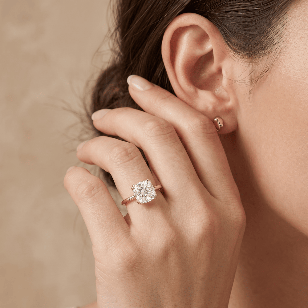Proposal-ready cushion moissanite solitaire ring lifestyle shot