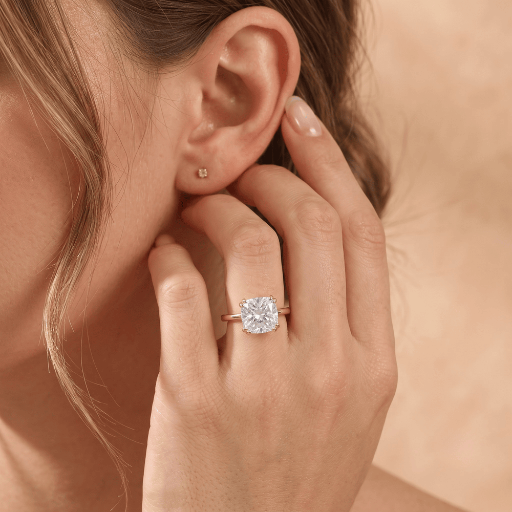 Proposal-ready cushion moissanite solitaire ring lifestyle shot