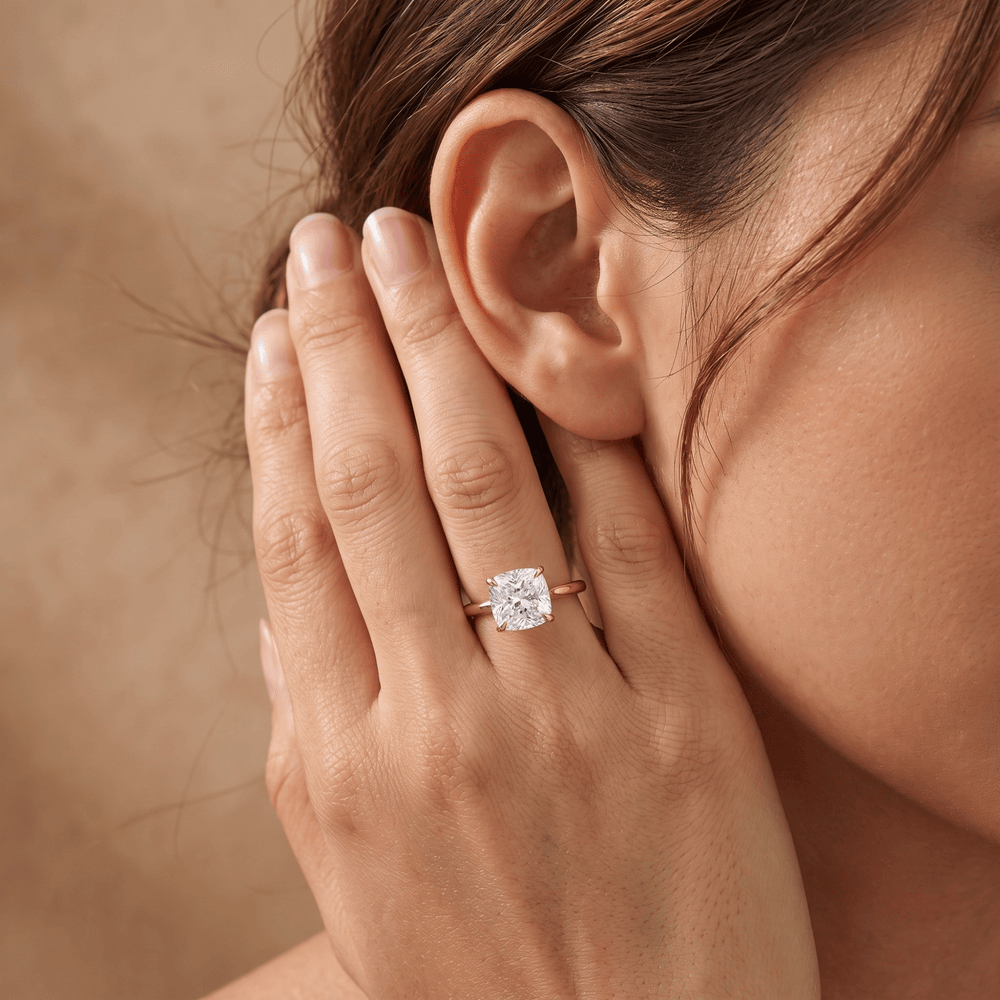 Cushion solitaire cathedral ring moissanite lifestyle shot