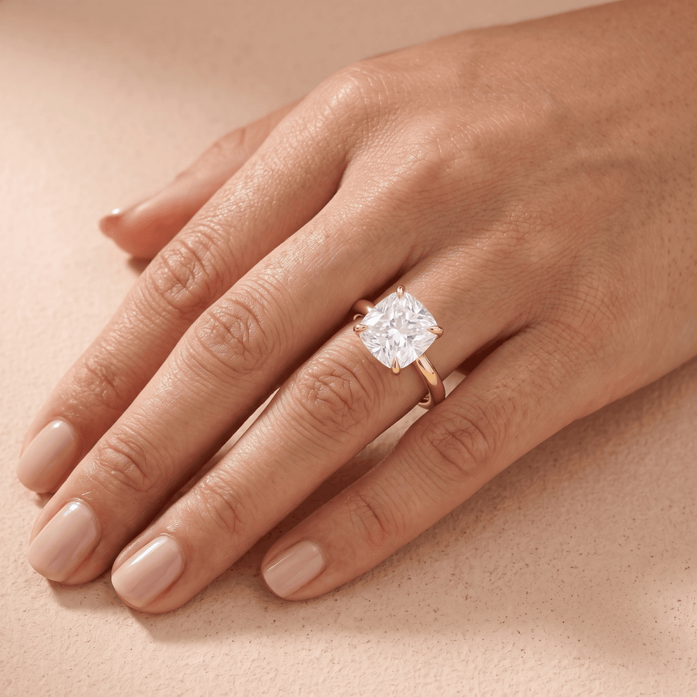 Cushion solitaire cathedral ring moissanite lifestyle shot
