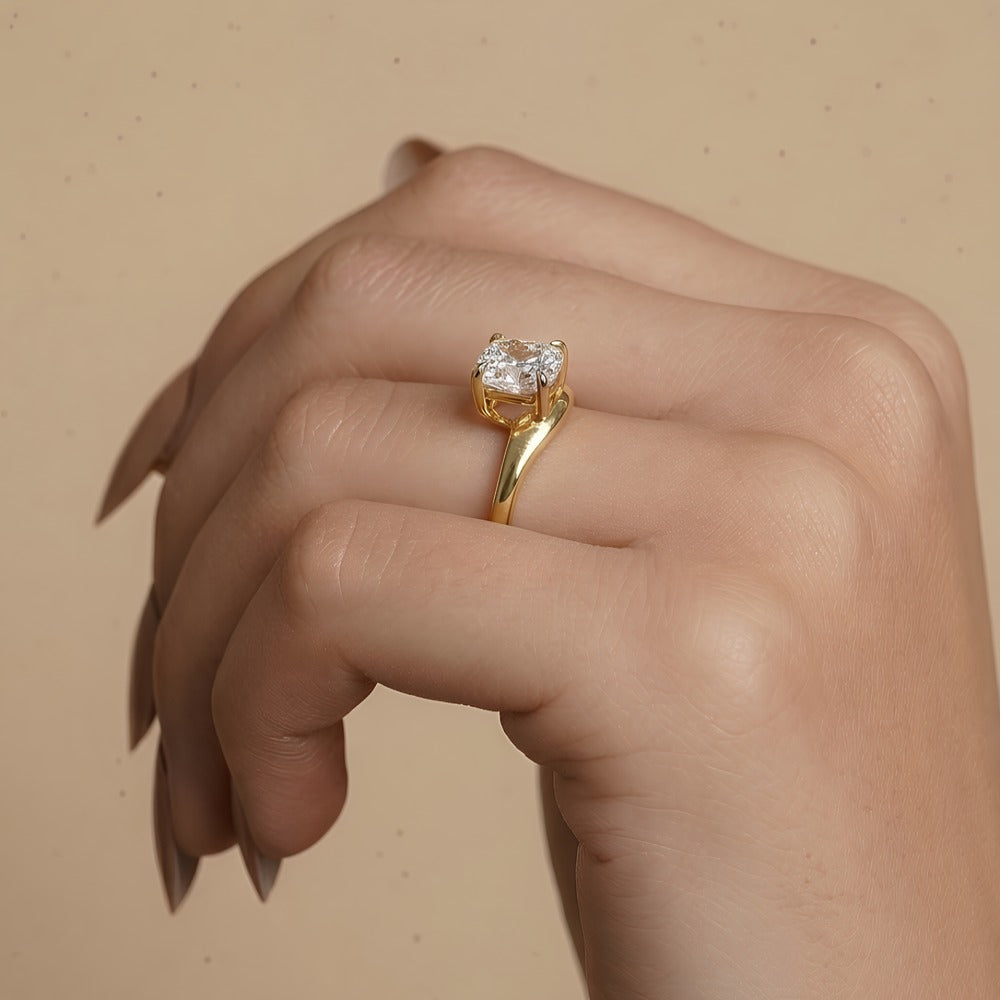 Cushion moissanite solitaire ring in yellow gold