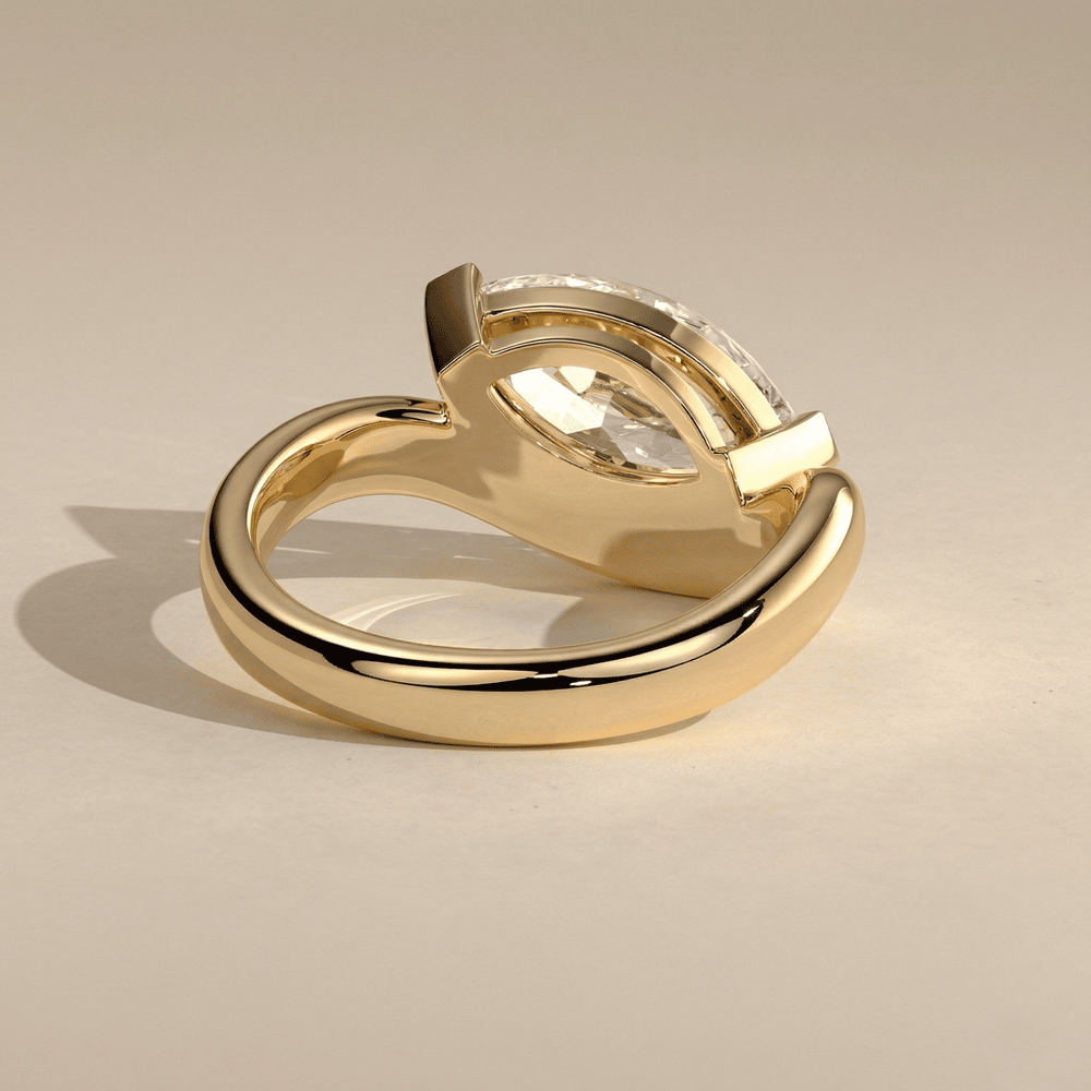 18KT yellow gold marquise solitaire engagement ring