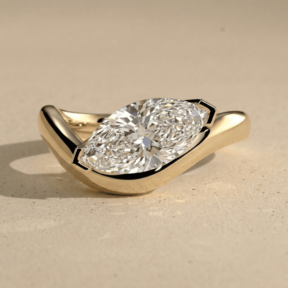 East west marquise engagement ring in solid 18KT gold