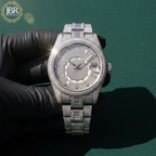 Elegant custom moissanite fully studded iced out VVS watch for men with sparkling stones, bold luxury design, and polished metal strap.