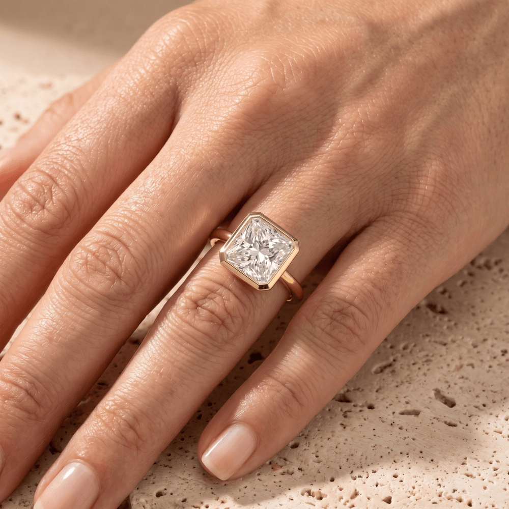 Classic bezel set radiant cut moissanite ring