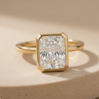 Elegant radiant moissanite bezel set ring front view