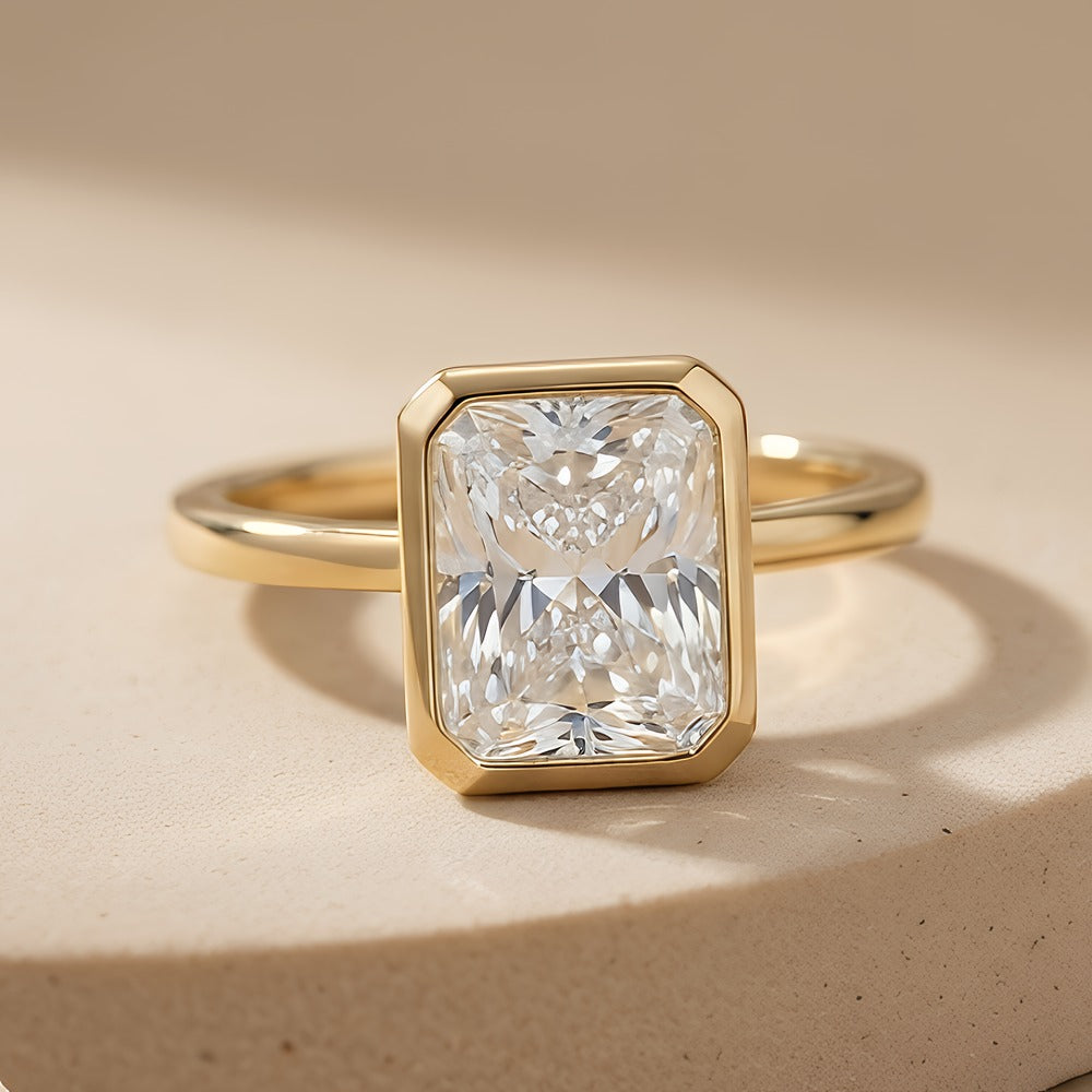 Elegant radiant moissanite bezel set ring front view