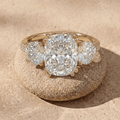 Elongated cushion lab diamond cathedral engagement ring