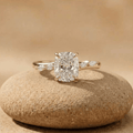 Elongated cushion lab diamond cathedral hidden halo engagement ring in 14 k yellow gold