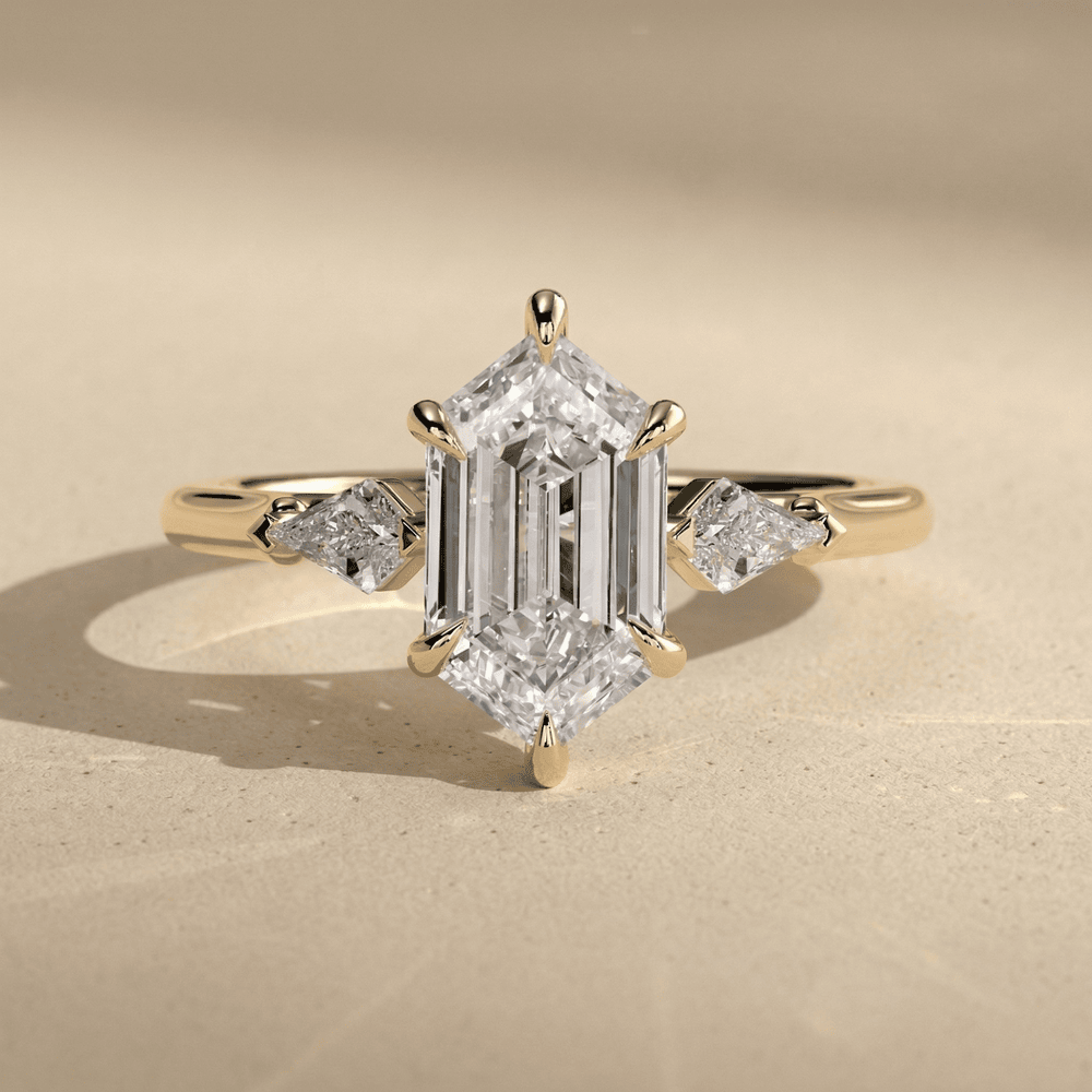 Elongated hexagon lab diamond three stone wedding ring