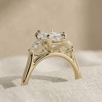 Elongated hexagon bridal ring with side diamonds