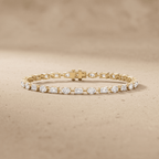 14K gold emerald oval diamond bracelet