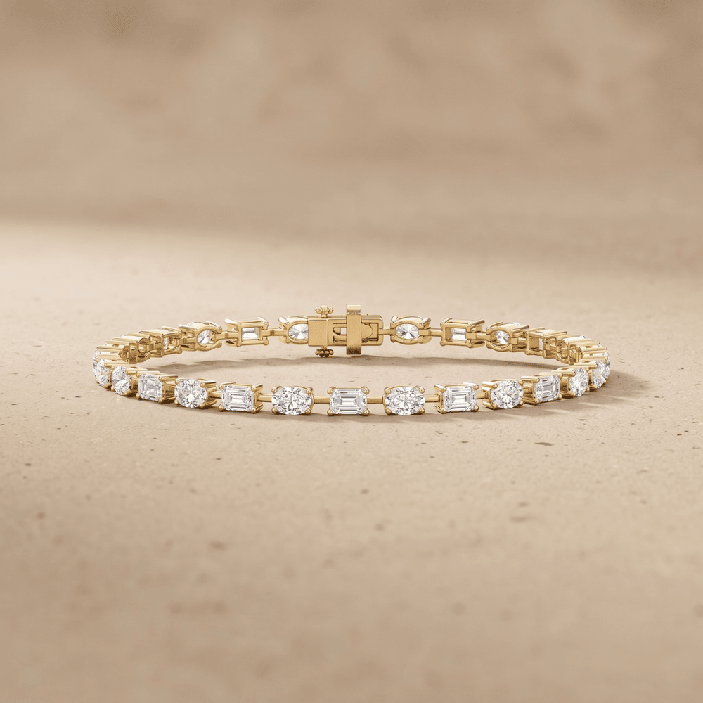 14K gold emerald oval diamond bracelet