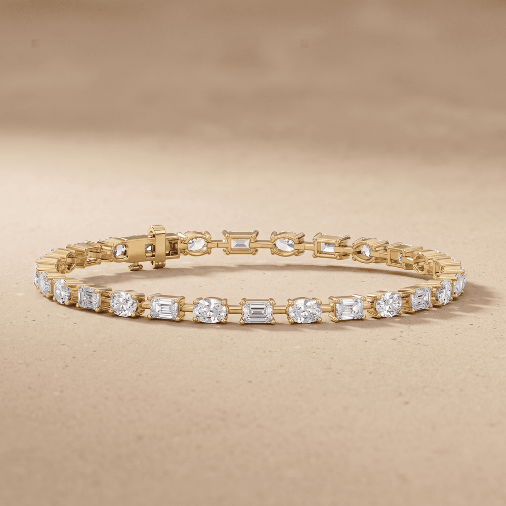Emerald and oval diamond tennis bracelet