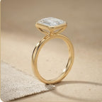 Bezel set emerald lab grown diamond ring side profile