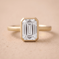 Emerald bezel set lab grown diamond anniversary ring 