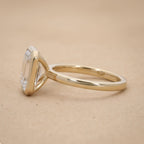 Bezel set emerald lab grown diamond ring side profile