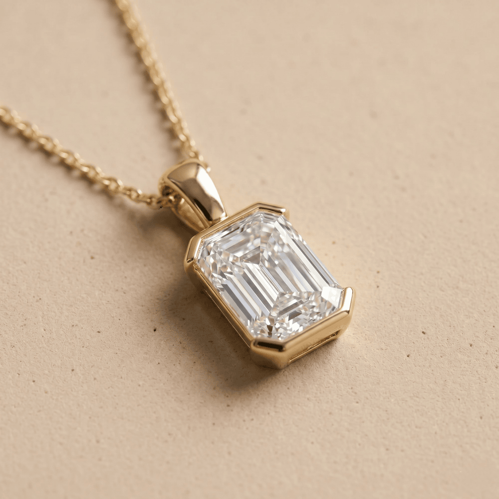 Emerald Cut Bezel Pendant Necklace in Gold Classic Solitaire