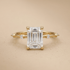 Elegant emerald moissanite engagement ring in gold