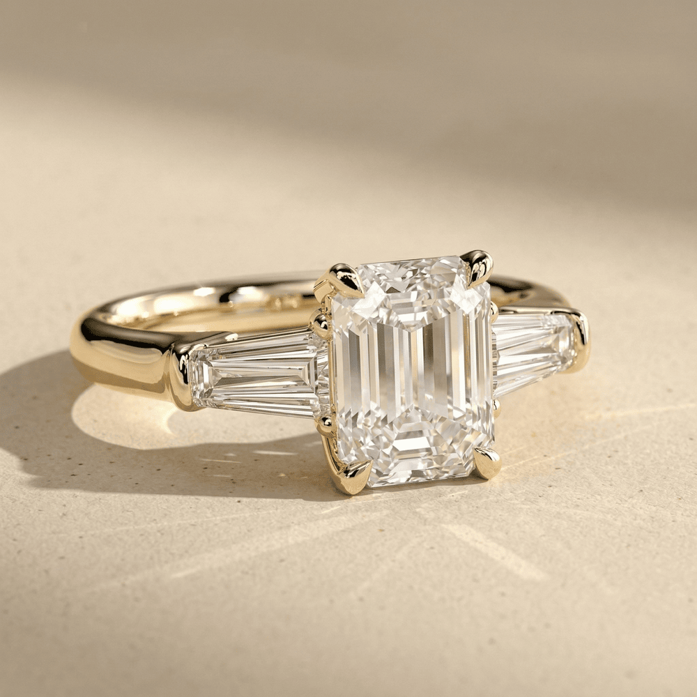 Emerald lab diamond bridal ring with baguette accents
