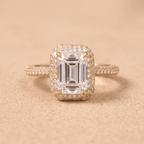 Emerald cut lab grown diamond halo ring in 14k gold