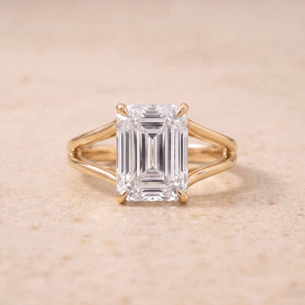 Emerald lab grown split shank solitaire ring front view