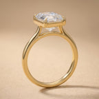 Emerald cut moissanite solitaire ring in 14K gold