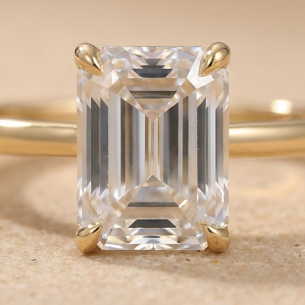Emerald moissanite promise ring diamond accent close-up