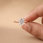Emerald moissanite promise ring side profile on model hand