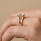 14k gold split band ring with emerald moissanite