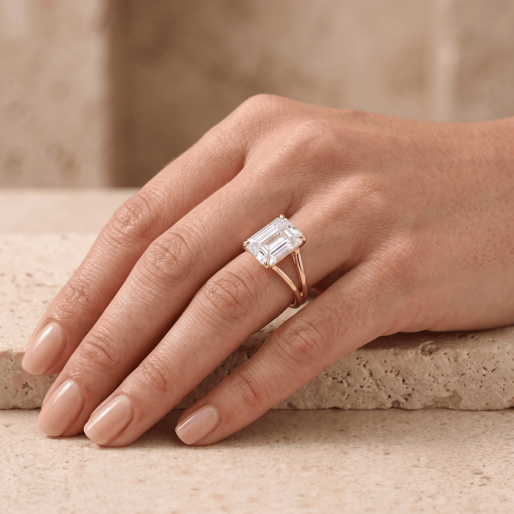 Emerald moissanite ring styled on model's hand