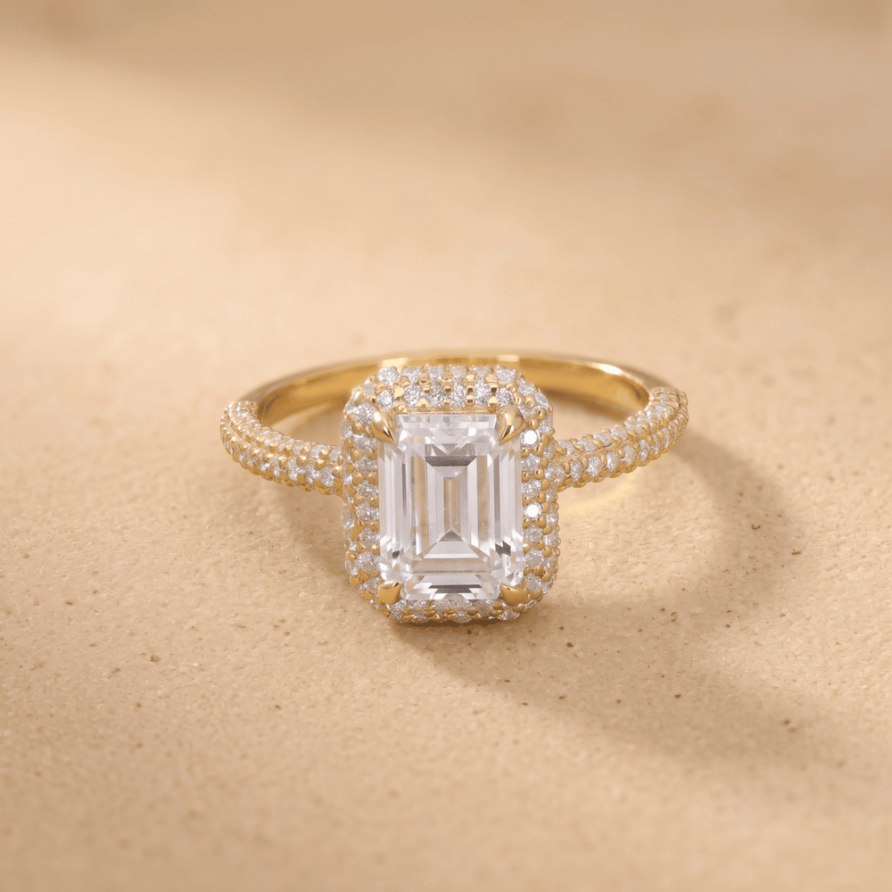 Petite halo engagement ring, emerald cut center stone