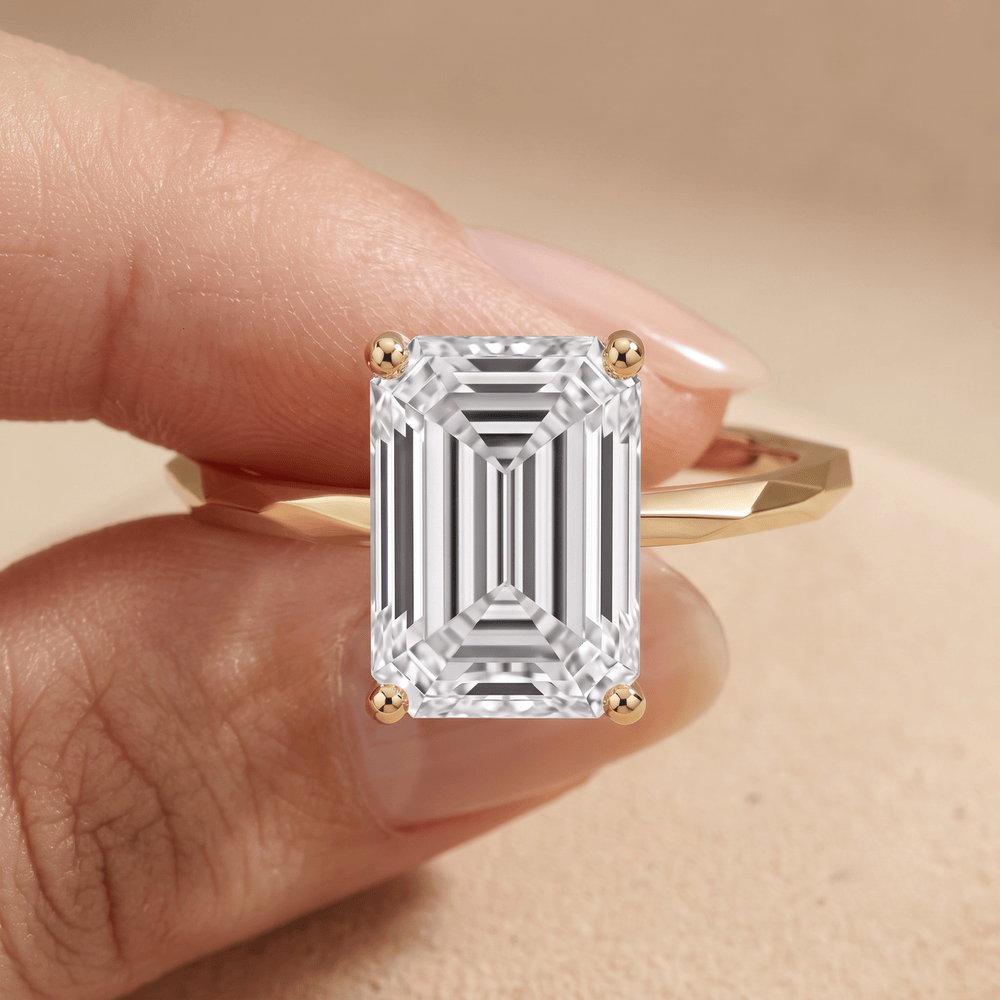 Ethically sourced moissanite engagement ring on hand