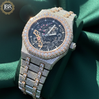 Fully studded iced out blue skeleton bust down watch with transparent dial, sparkling stones, and bold luxury statement design.