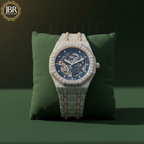 Fully studded iced out blue skeleton bust down watch with transparent dial, sparkling stones, and bold luxury statement design.