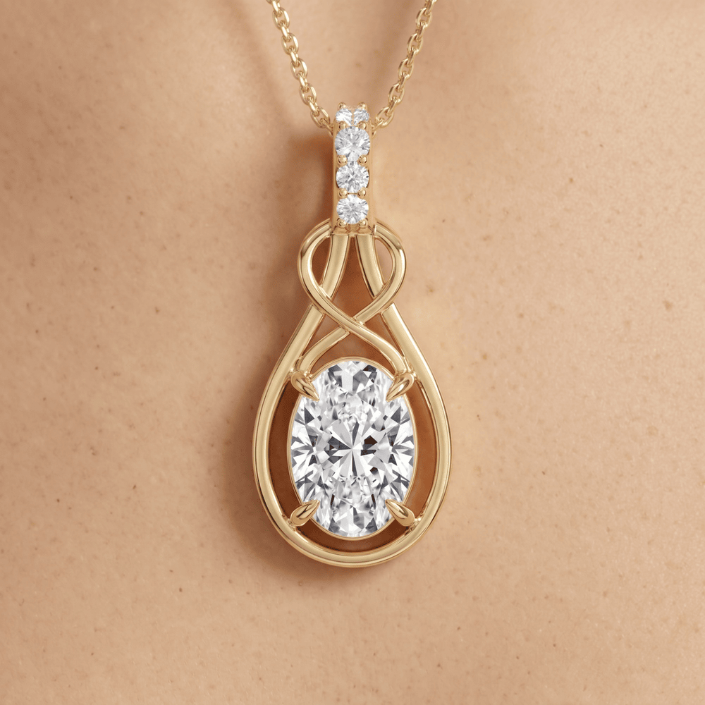 Gold Infinity Pendant Necklace with Oval Clear Stone