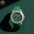Green watch with diamond-studded bezel on a green background, featuring JBR Jeweler
